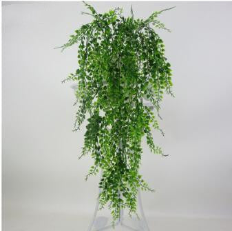 Décoration murale persane avec plantes et vignes