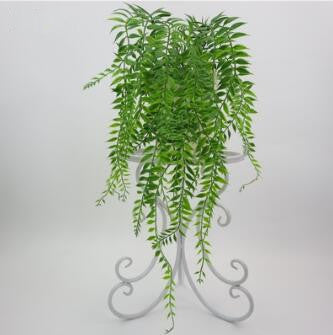 Décoration murale persane avec plantes et vignes